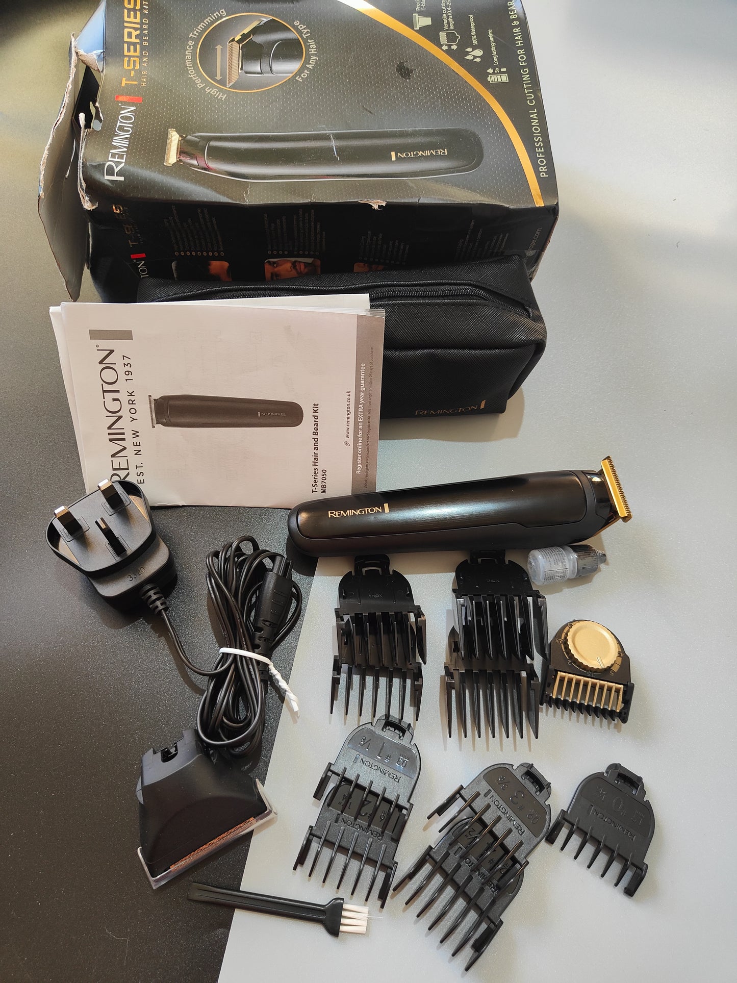 Remington T-Series Men's Hair Clipper and Beard Trimmer Kit - Cordless Professional Grooming Kit with 11 Attachments - MB7050